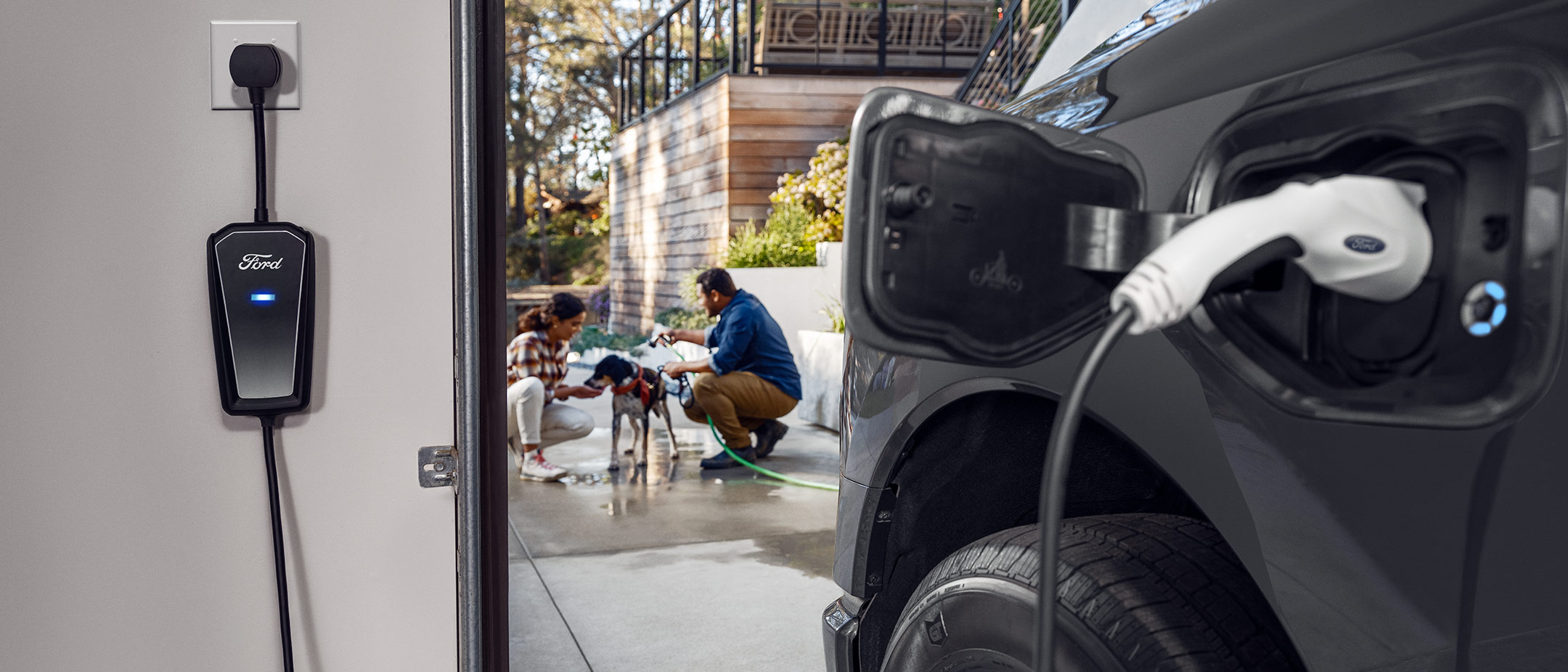 A Ford electric vehicle being charged at home