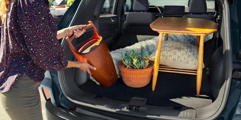 2026 Ford Escape rear cargo area in Benton AR with trunk full of antiques showing spacious storage capacity
