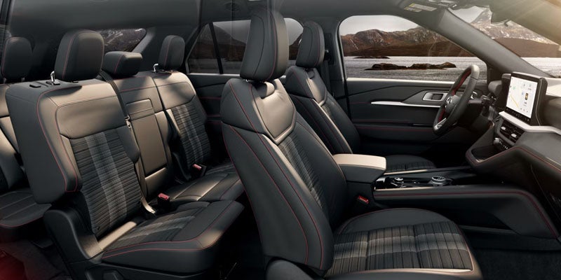 2026 Ford Explorer interior in Benton AR showing leather seating, panoramic Vista Roof, and spacious cabin
