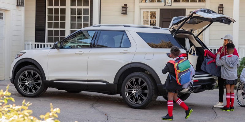 2026 Ford Explorer in Benton AR transporting family with kids soccer gear, showing spacious rear storage